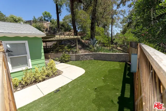 a view of outdoor space and yard