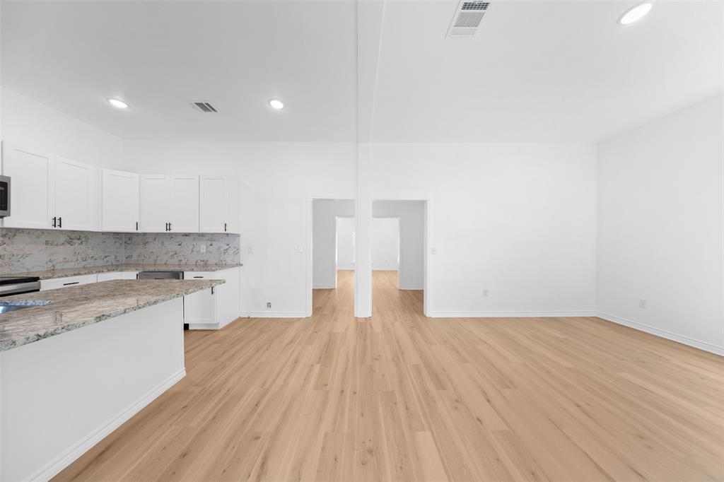 507 2nd Street Moody, TX 76557 - Photo 20 of 40 a view of a kitchen with wooden floor and a sink