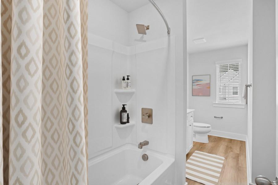 1575 Cedars Road Southeast, Unit REDBUD Lawrenceville, GA 30045 - Photo 11 of 17 a bathroom with a bathtub and a shower