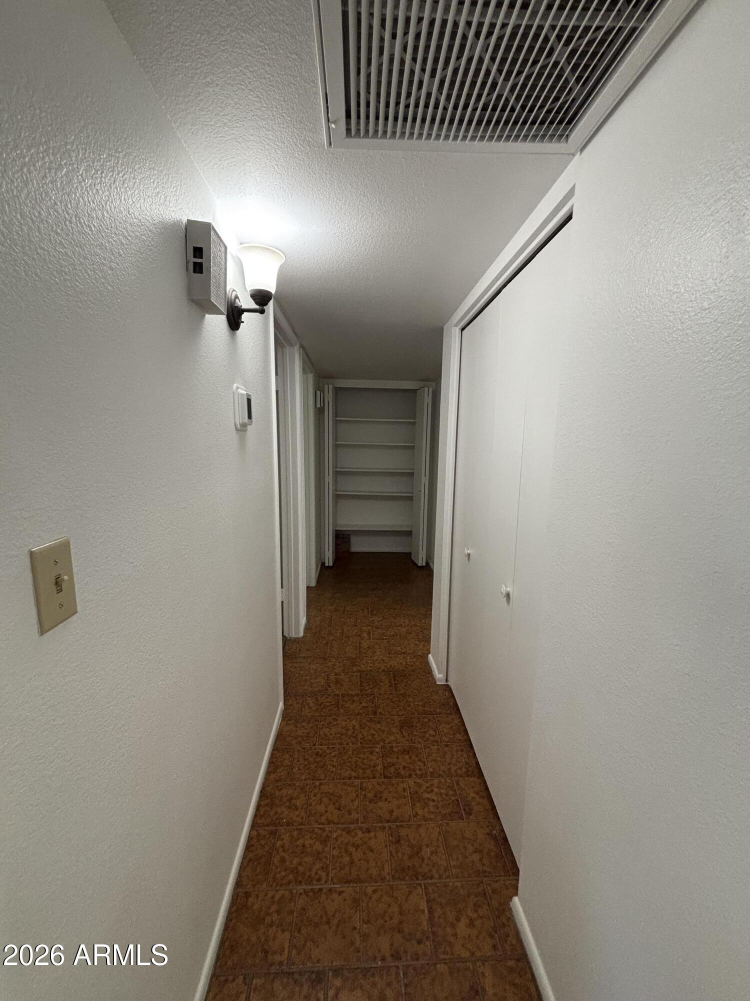 6508 West Fremont Road Laveen, AZ 85339 - Photo 11 of 32 a view of hallway with stairs