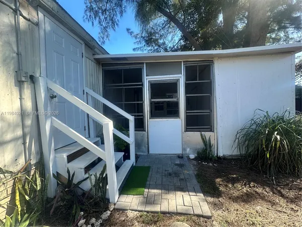 a front view of house with yard