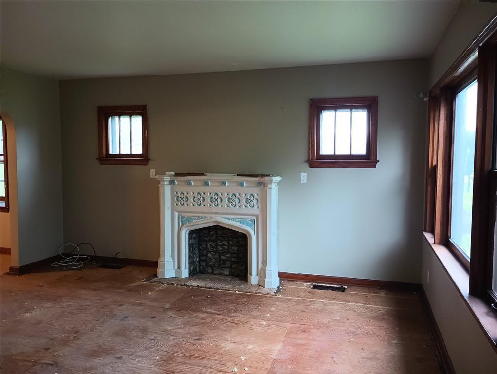 106 Conneaut Lake Road Greenville, PA 16125 - Photo 4 of 18 a view of empty room with a fireplace