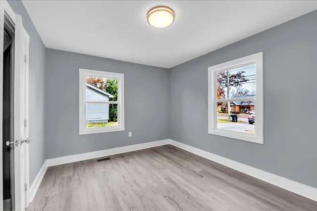 an empty room with windows