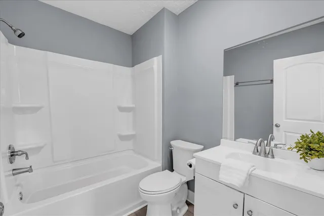 an empty room with a empty space and window