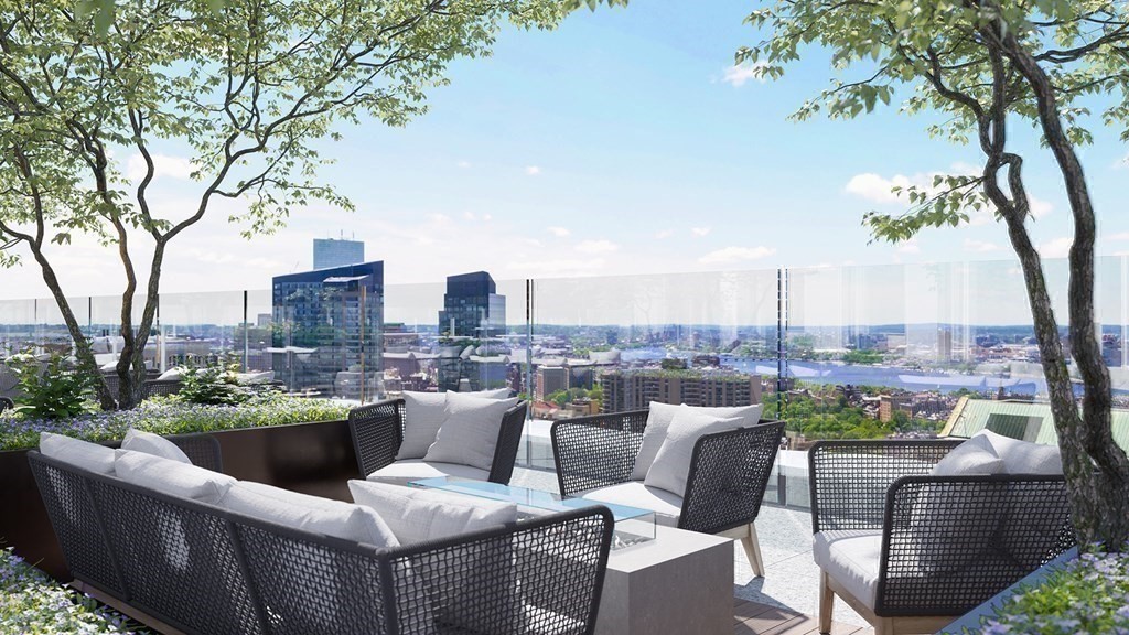 240 Devonshire Street, Unit 4708 Boston, MA 02110 - Photo 17 of 42 a view of balcony with furniture and city view