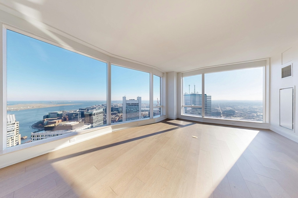 240 Devonshire Street, Unit 4708 Boston, MA 02110 - Photo 2 of 42 a view of a living room hardwood floor and a large window