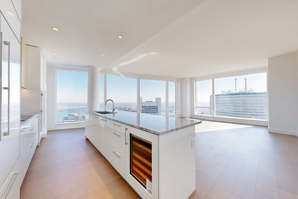 240 Devonshire Street, Unit 4708 Boston, MA 02110 - Photo 4 of 42 a large white kitchen with a large window