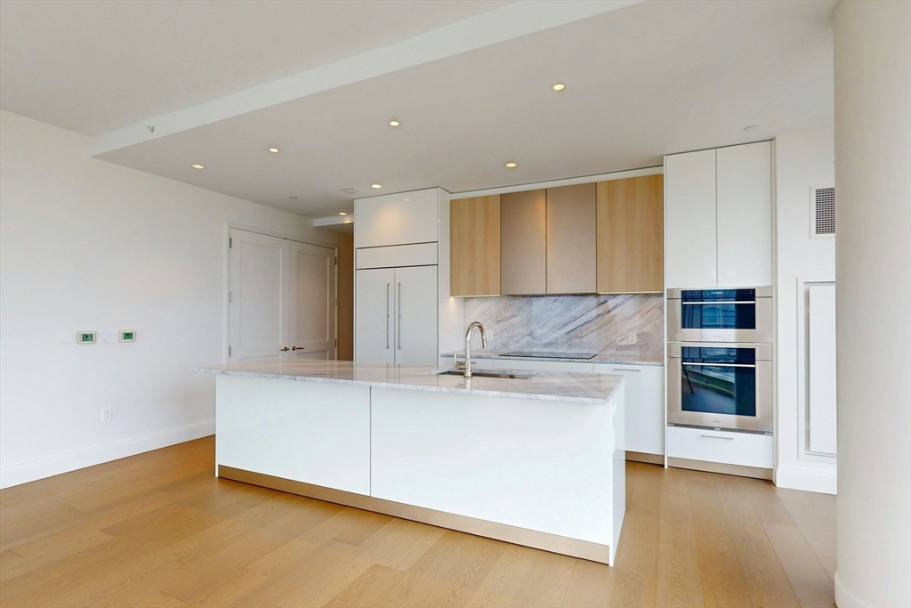 240 Devonshire Street, Unit 4708 Boston, MA 02110 - Photo 5 of 42 a view of a kitchen with a sink