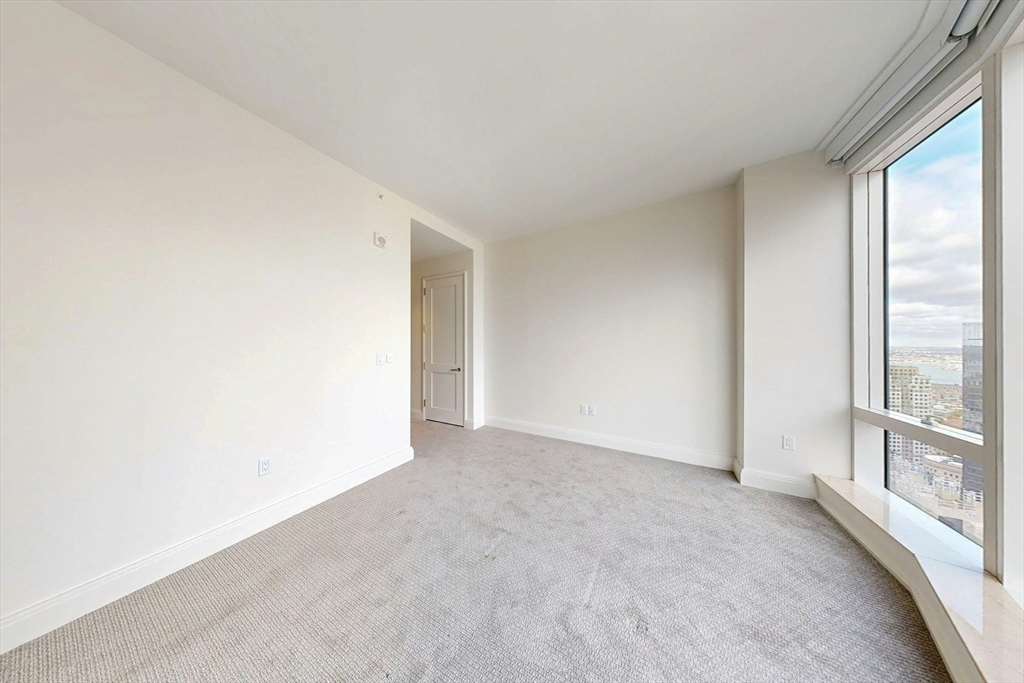 240 Devonshire Street, Unit 4708 Boston, MA 02110 - Photo 10 of 42 a view of an empty room with a window