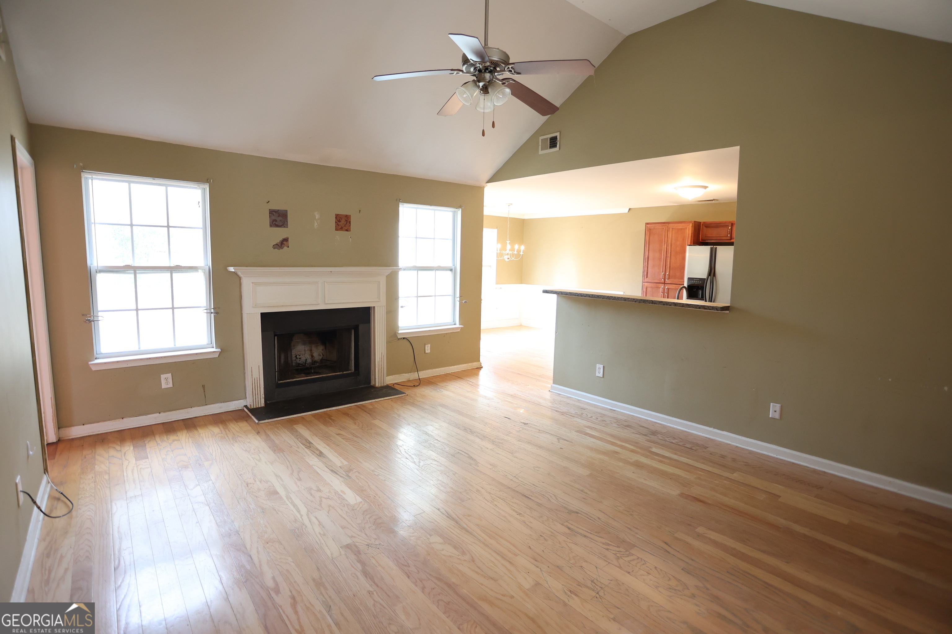 61 Concord Street North Concord, GA 30206 - Photo 18 of 37 a view of empty room with wooden floor and fan
