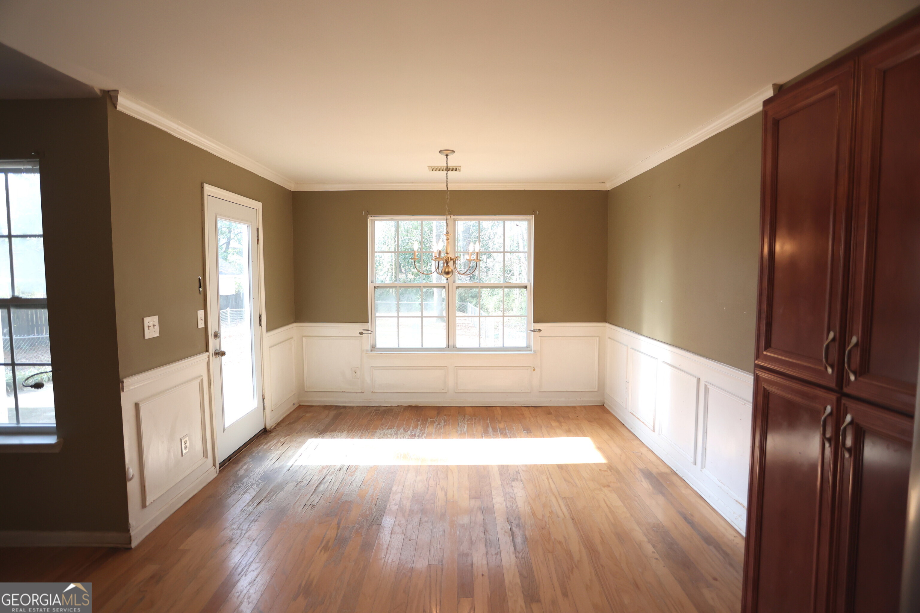 61 Concord Street North Concord, GA 30206 - Photo 20 of 37 wooden floor in an empty room with a window