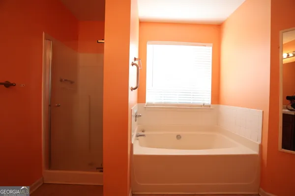 a bathroom with a bathtub