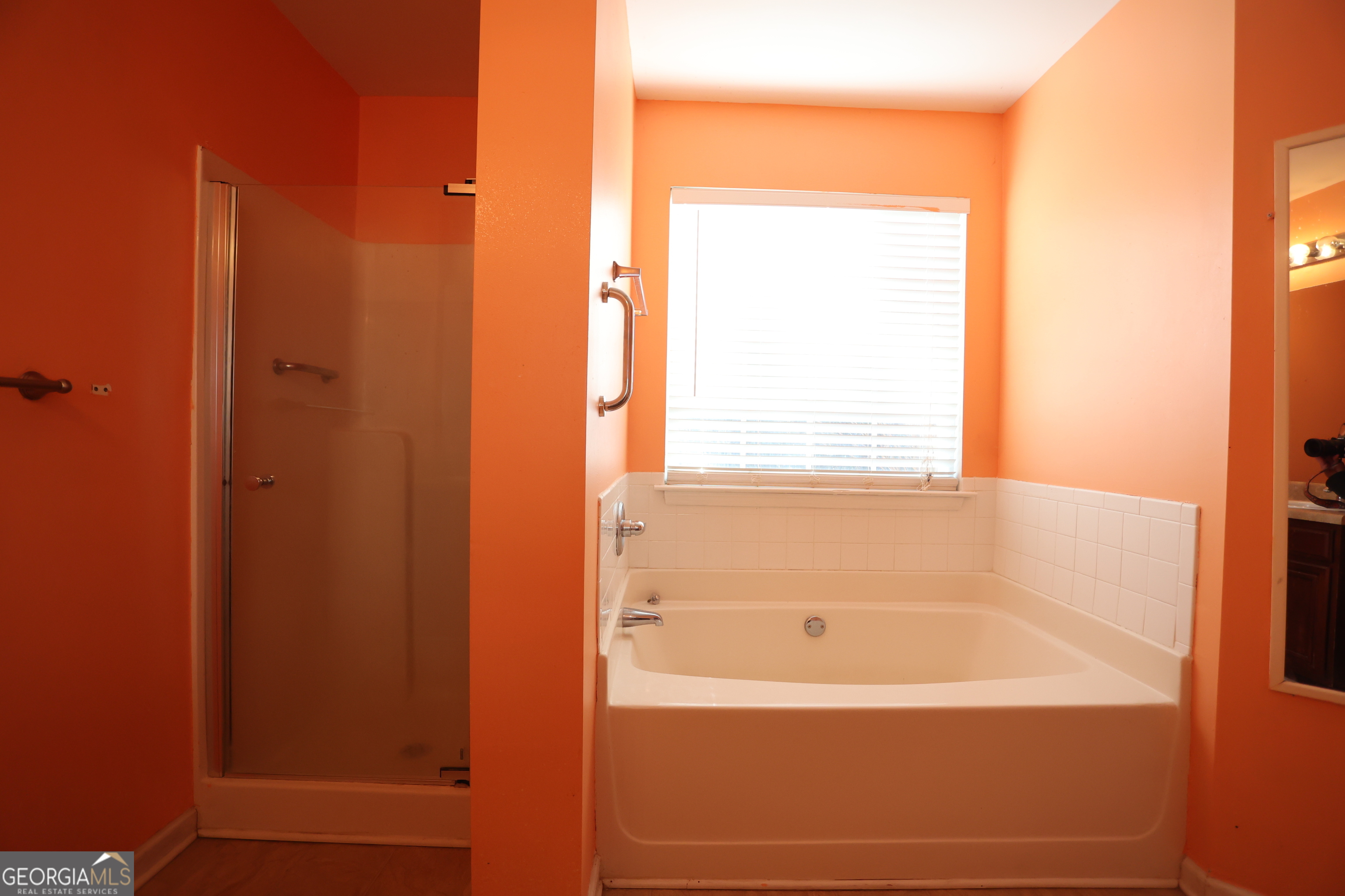 61 Concord Street North Concord, GA 30206 - Photo 31 of 37 a bathroom with a bathtub