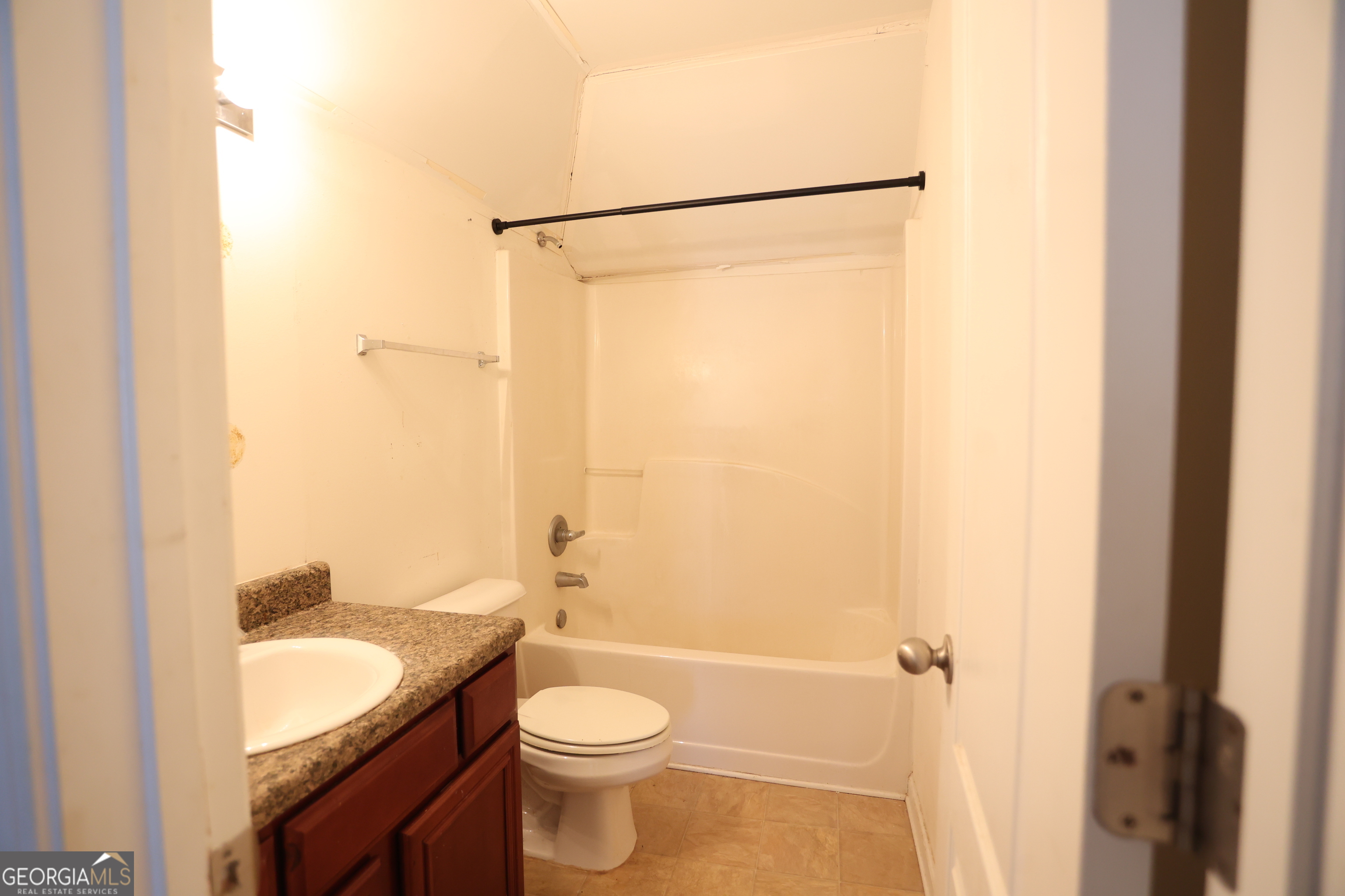 61 Concord Street North Concord, GA 30206 - Photo 35 of 37 a bathroom with a granite countertop sink toilet and shower