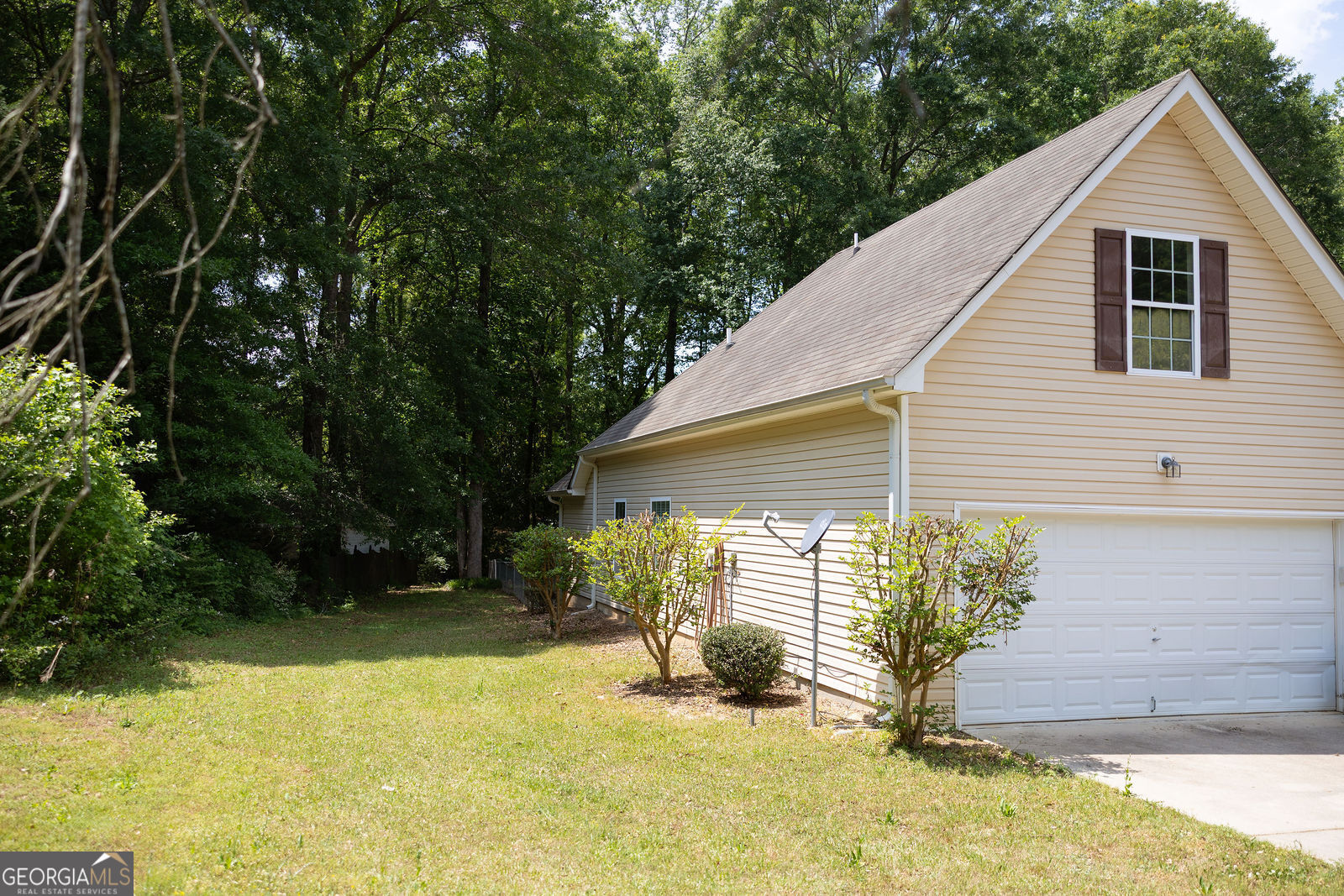 61 Concord Street North Concord, GA 30206 - Photo 5 of 37 a view of a house with backyard and sitting area