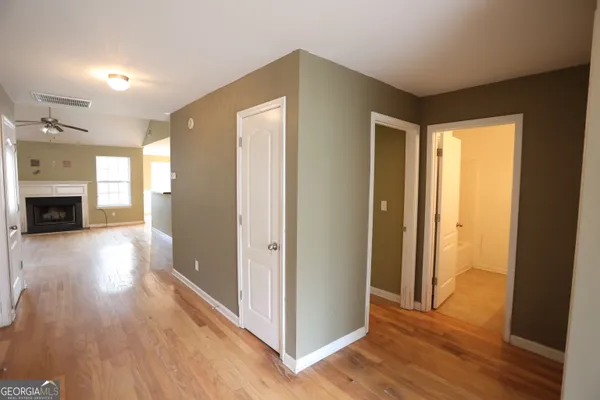 a view of livingroom with furniture and a fireplace