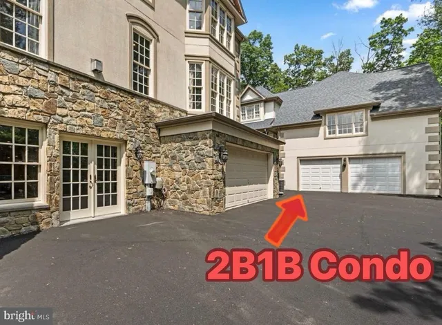 a view of a house with a garage