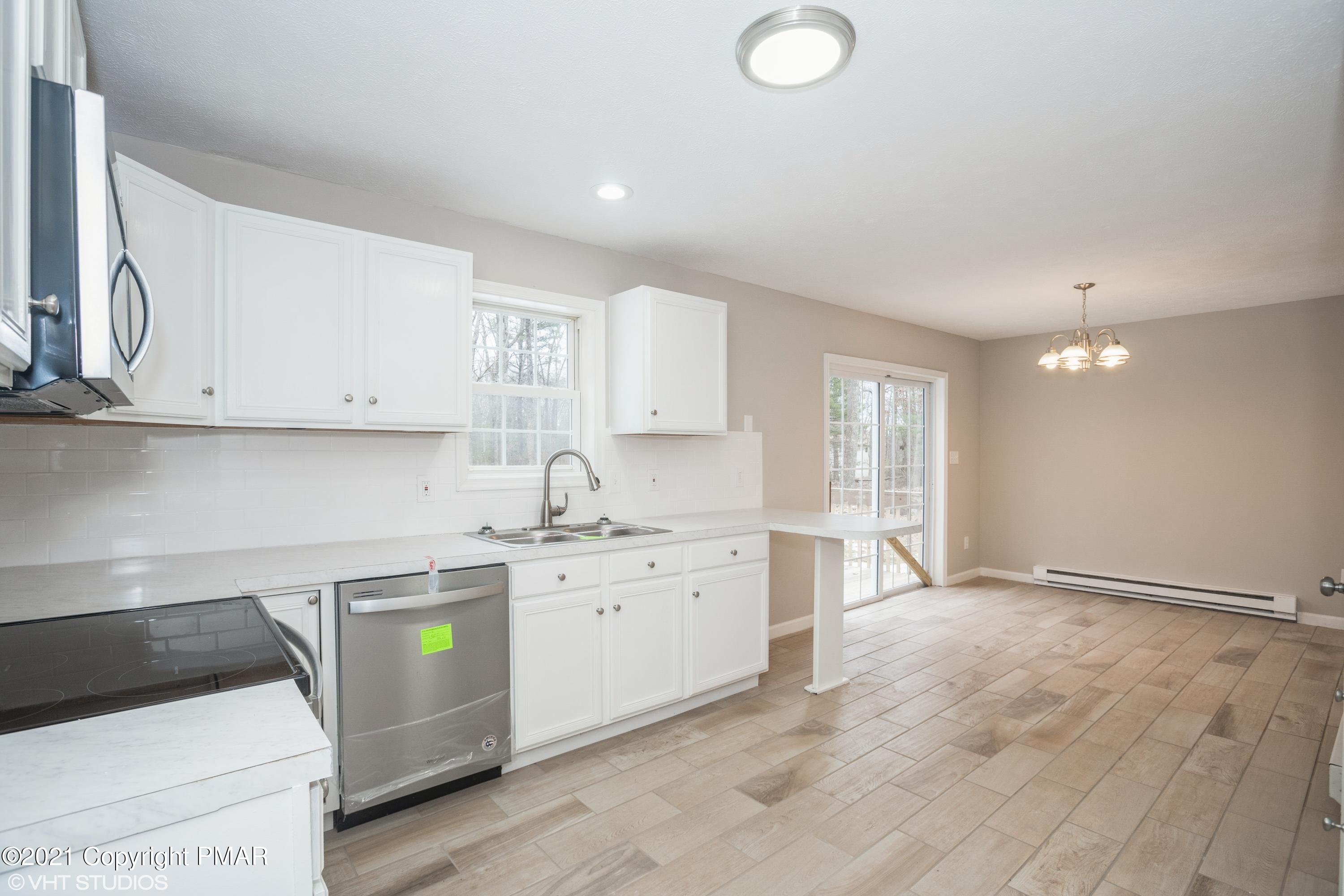 617 Silver Lake Road Dingmans Ferry, PA 18328 - Photo 4 of 15 03_617SilverLakeRoad_5_Kitchen_HiRes