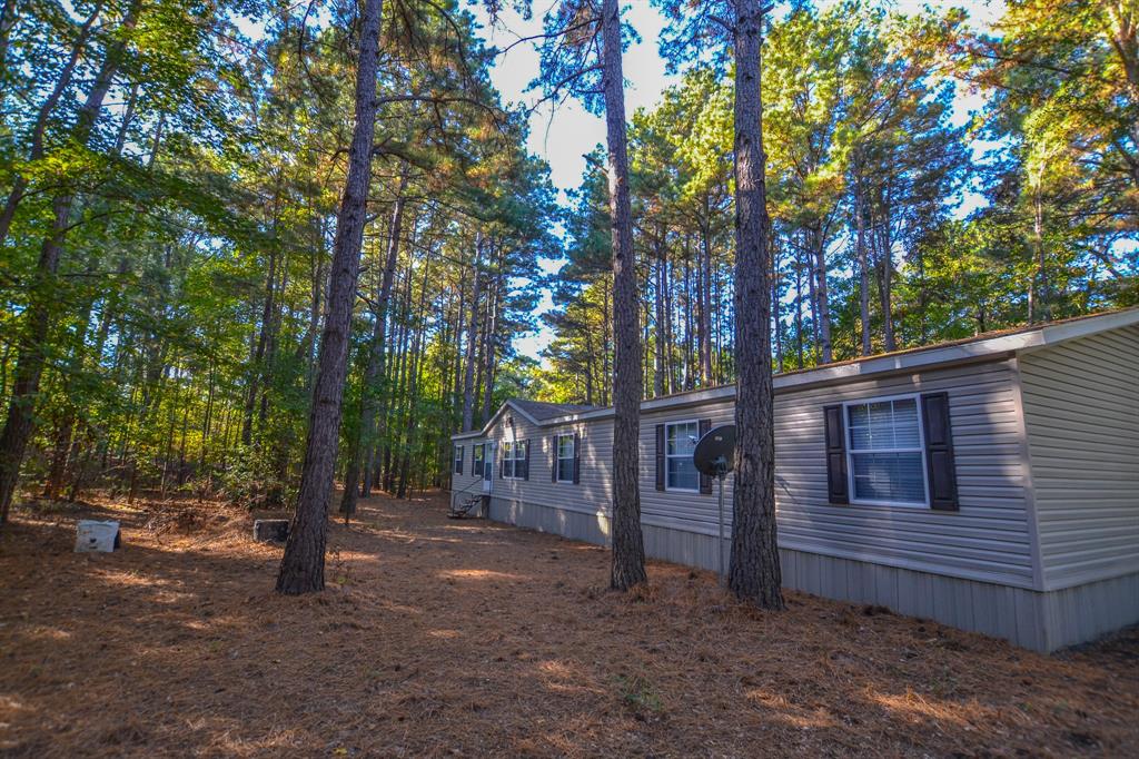0 County Road 3409 Chandler, TX 75758 - Photo 11 of 38 a view of a house with a tree