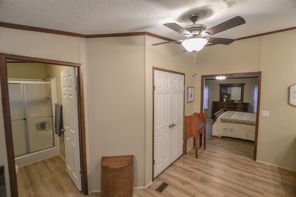 0 County Road 3409 Chandler, TX 75758 - Photo 21 of 38 a view of a livingroom with a flat screen tv