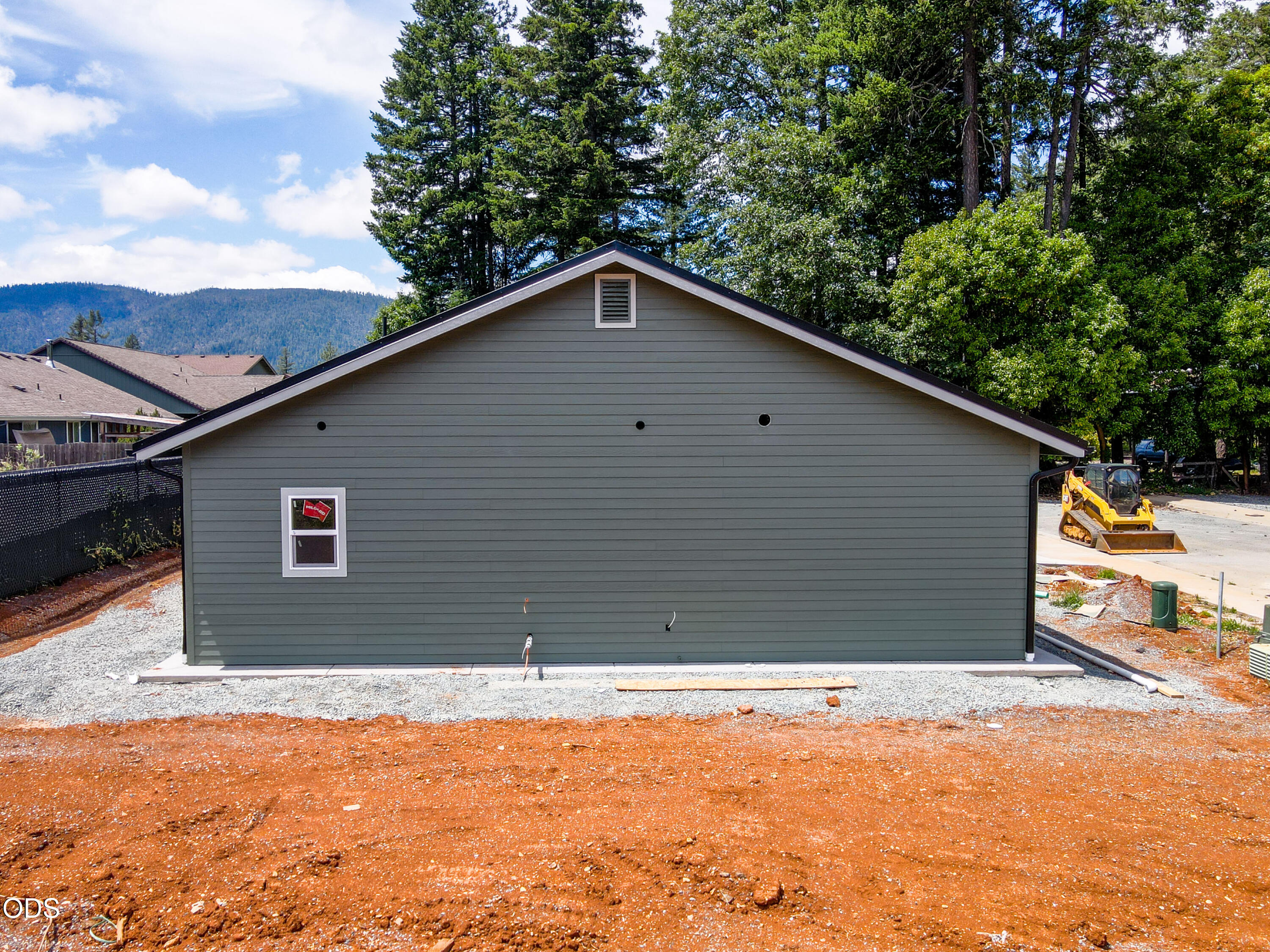 405 Cece Lane Cave Junction, OR 97523 - Photo 8 of 15 a backyard of a house