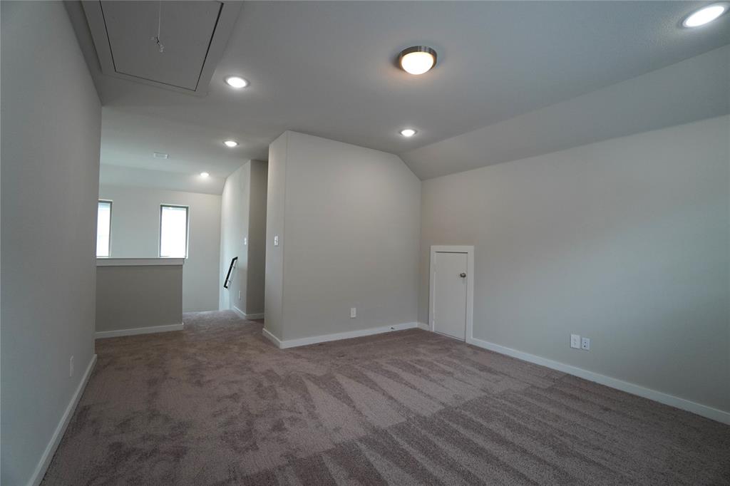 2512 Green River Road Royse City, TX 75189 - Photo 11 of 13 an empty room with wooden floor and windows