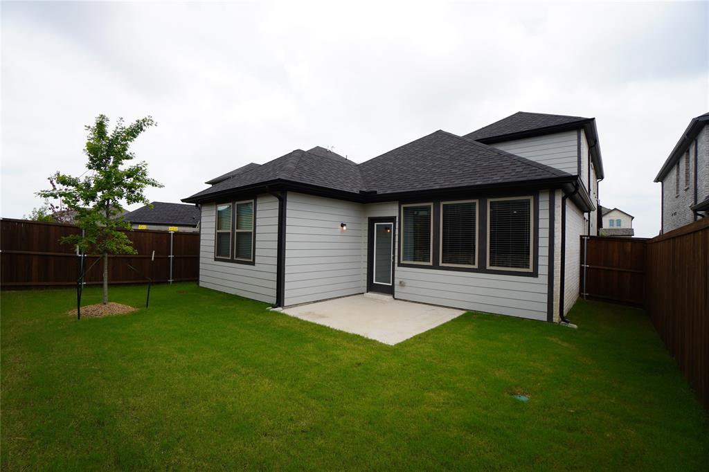2512 Green River Road Royse City, TX 75189 - Photo 13 of 13 a backyard of a house with table and chairs