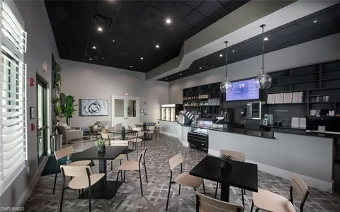 a living room with lots of furniture and a flat screen tv