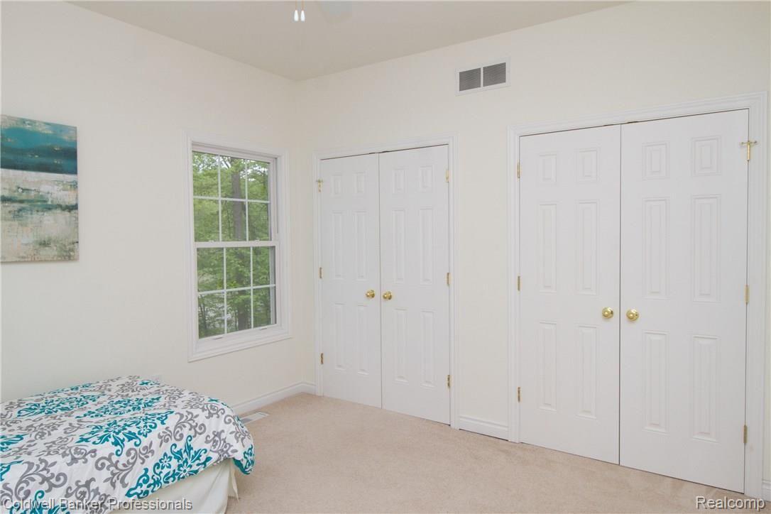 11020 Hensell Road Holly, MI 48442 - Photo 34 of 93 First floor bedroom with attached bathroom access.