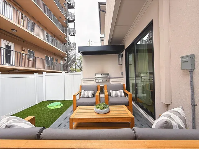 a bedroom with a bed and a chair