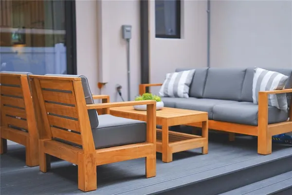 a view of a hallway with seating space