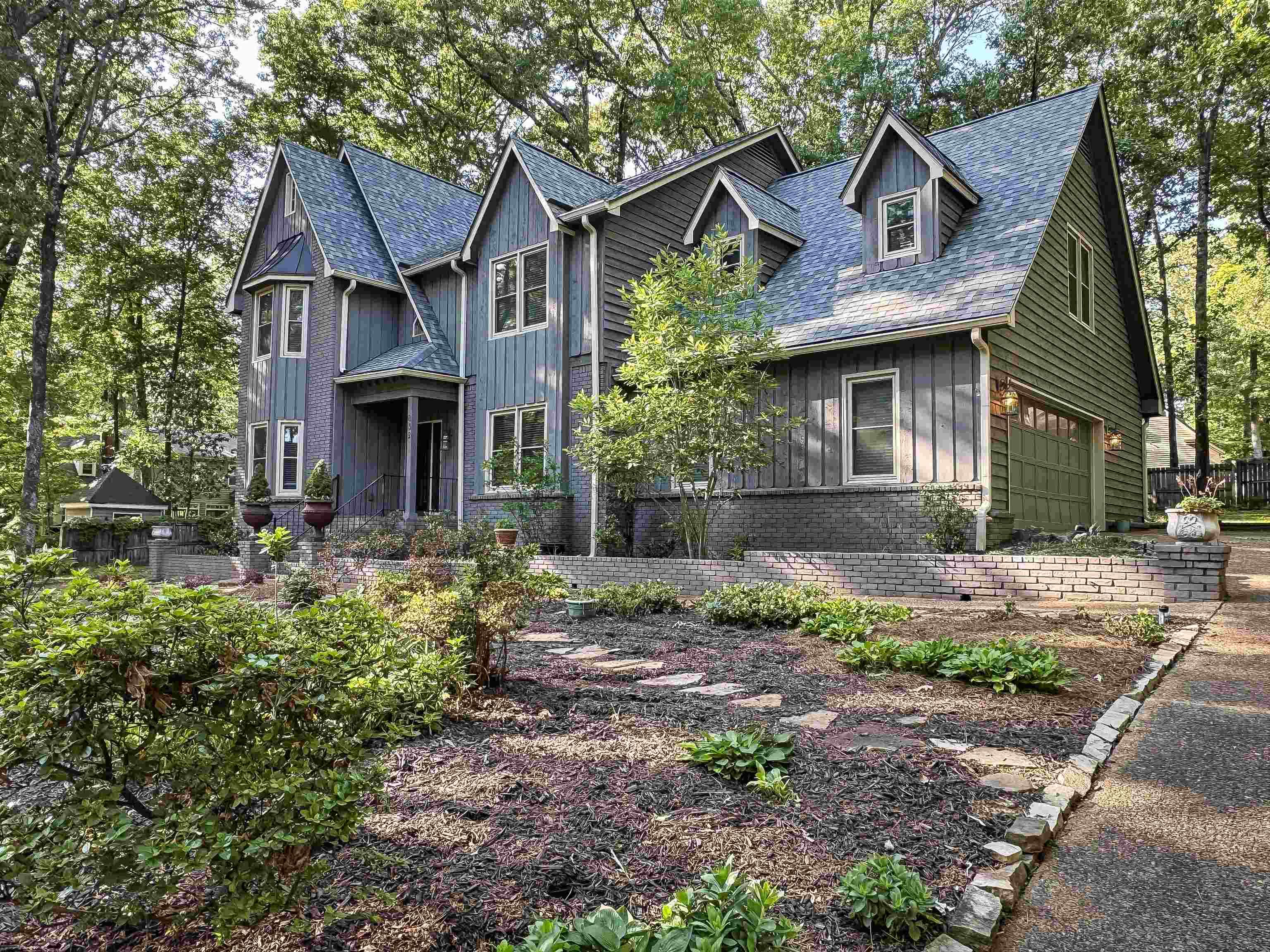 832 South Tree Drive Collierville, TN 38017 - Photo 38 of 40 Multi-level exterior with dormer windows, featuring a prominent front entrance and an attached garage