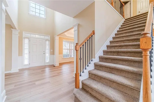 a view of a livingroom with wooden floor