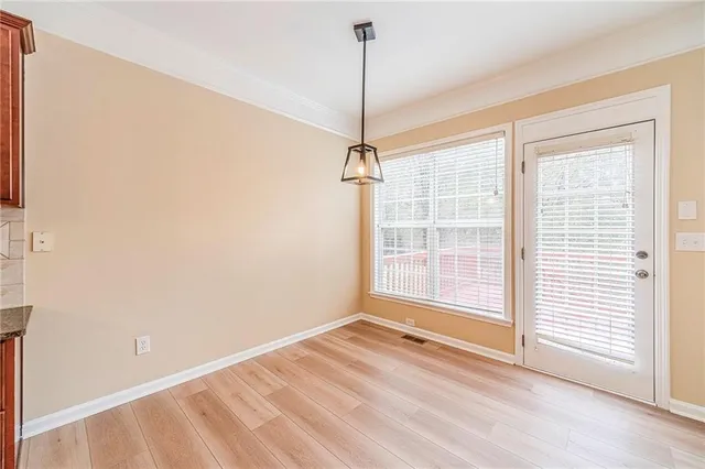a bathroom with a sink a toilet and bathtub