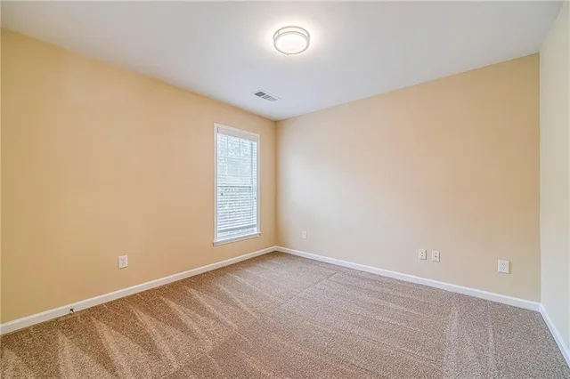 a view of balcony with wooden floor