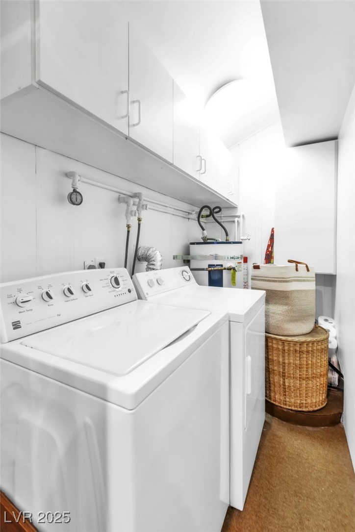 4063 Zugspitz Way Mount Charleston, NV 89124 - Photo 75 of 89 Laundry area with independent washer and dryer and strapped water heater