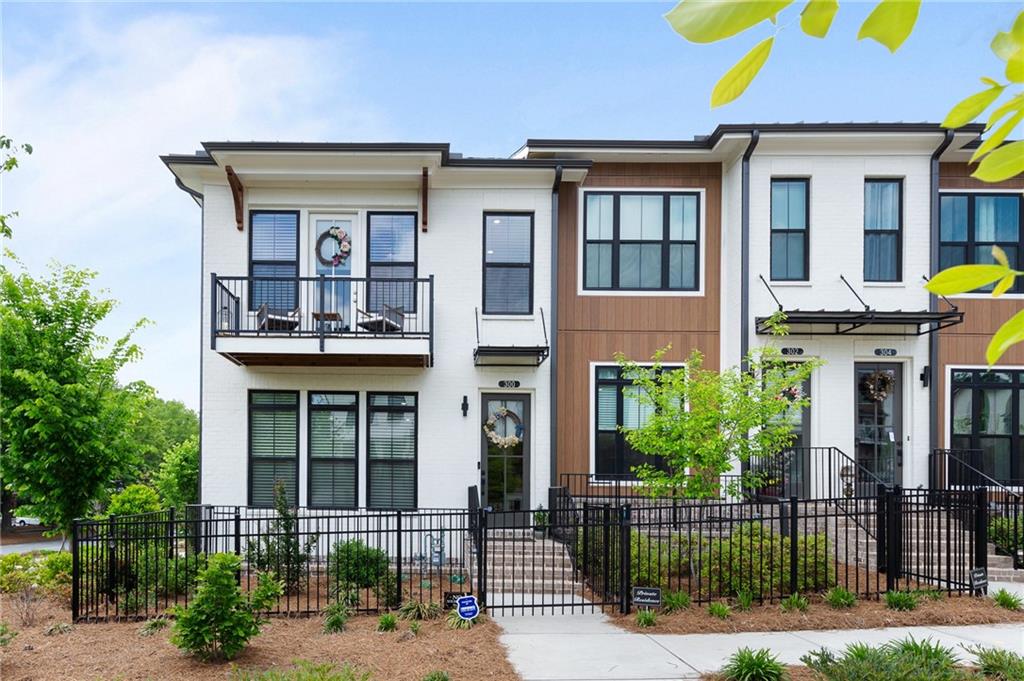 a front view of a house with a porch