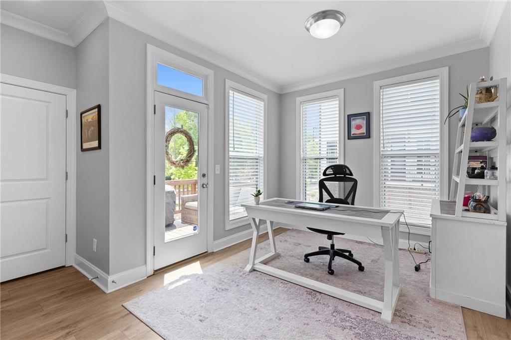 300 Olmstead Way Alpharetta, GA 30022 - Photo 21 of 52 a view of a workspace with furniture and a window