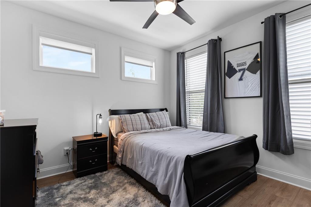 300 Olmstead Way Alpharetta, GA 30022 - Photo 37 of 52 a bedroom with a bed and a window