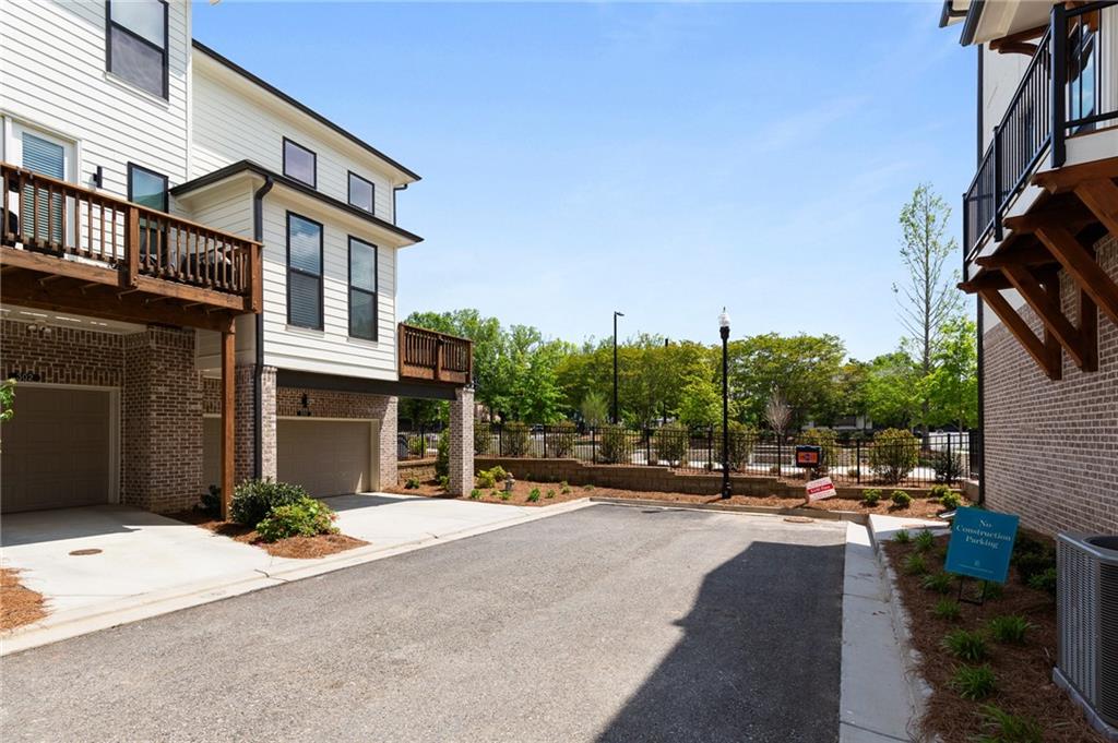 300 Olmstead Way Alpharetta, GA 30022 - Photo 46 of 52 a view of a street with houses