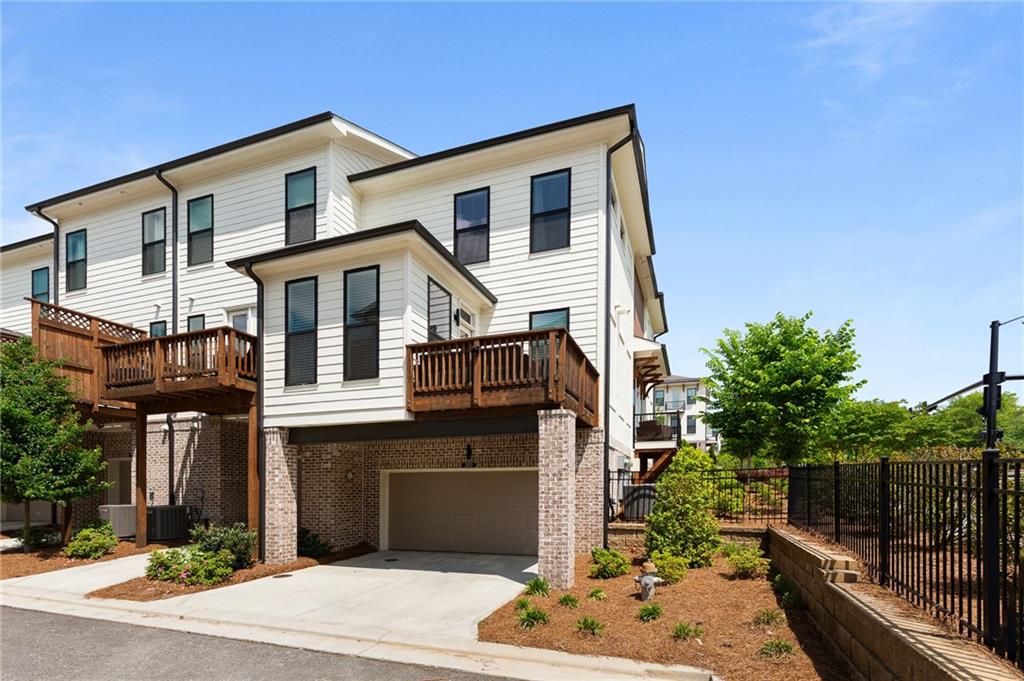 300 Olmstead Way Alpharetta, GA 30022 - Photo 48 of 52 a front view of a house with a yard