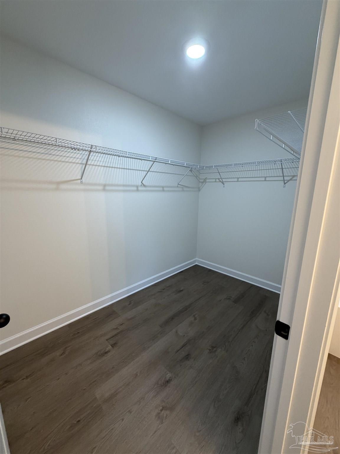 6288 Long Street Milton, FL 32570 - Photo 14 of 16 a view of a room with wooden floor