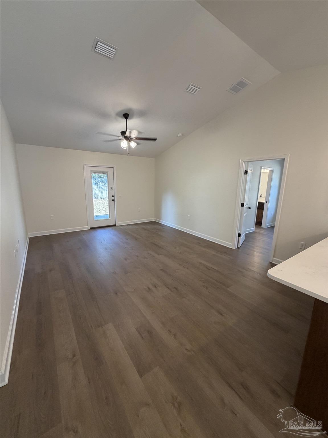 6288 Long Street Milton, FL 32570 - Photo 3 of 16 a view of an empty room with a window