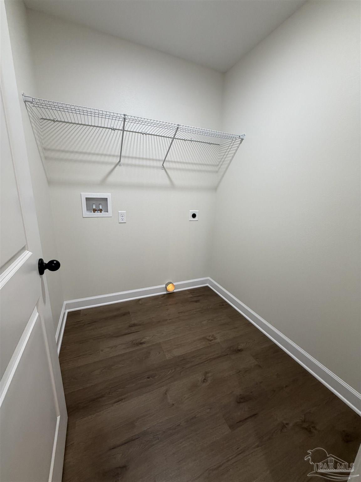 6288 Long Street Milton, FL 32570 - Photo 9 of 16 a view of a room with racks on the wall