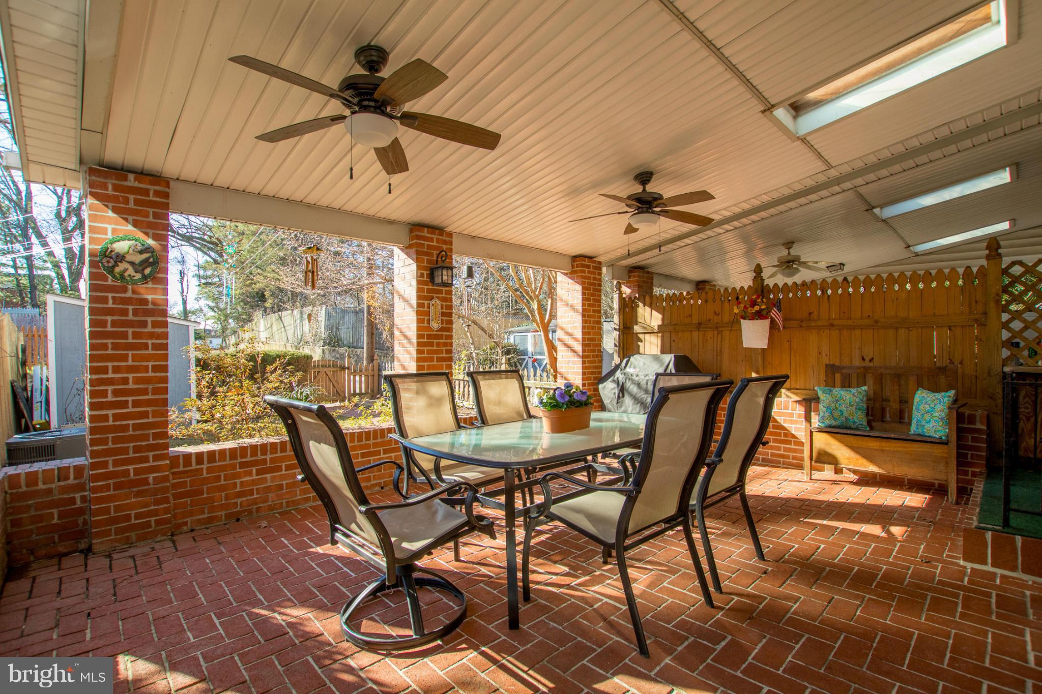 8237 Pleasant Plains Road Towson, MD 21286 - Photo 25 of 30 Dining patio with two ceiling fans