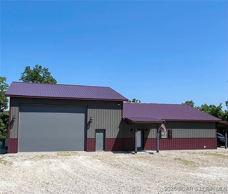 26450 Eagle Point Road, Unit (70' LAKEFRONT) Barnett, MO 65011 - Photo 12 of 52 Flat gentle home location with main level living!