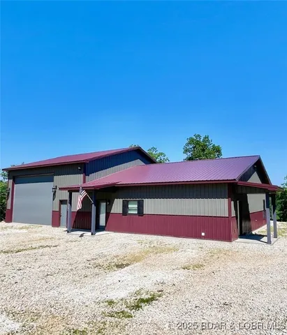 $774,999 | 26450 Eagle Point Road, Unit (70' LAKEFRONT), Barnett, MO 65011