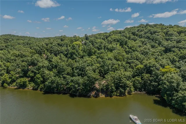 $774,999 | 26450 Eagle Point Road, Unit (70' LAKEFRONT), Barnett, MO 65011