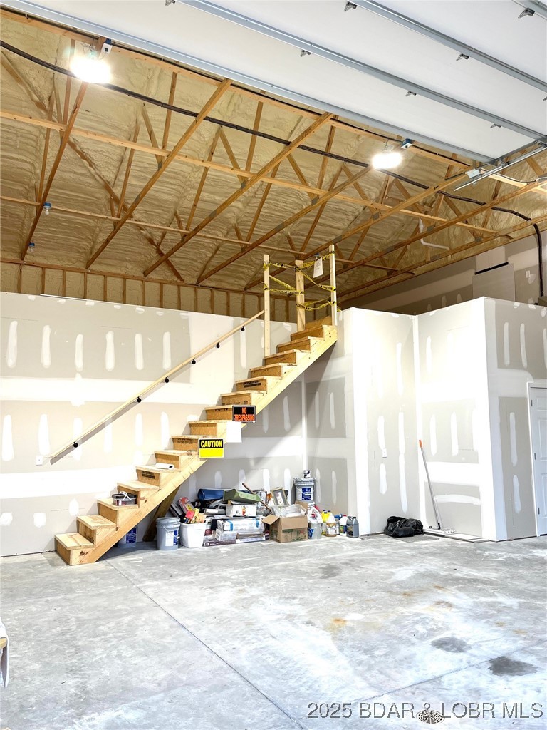 26450 Eagle Point Road, Unit (70' LAKEFRONT) Barnett, MO 65011 - Photo 48 of 52 Drop ceiling light storage and garage