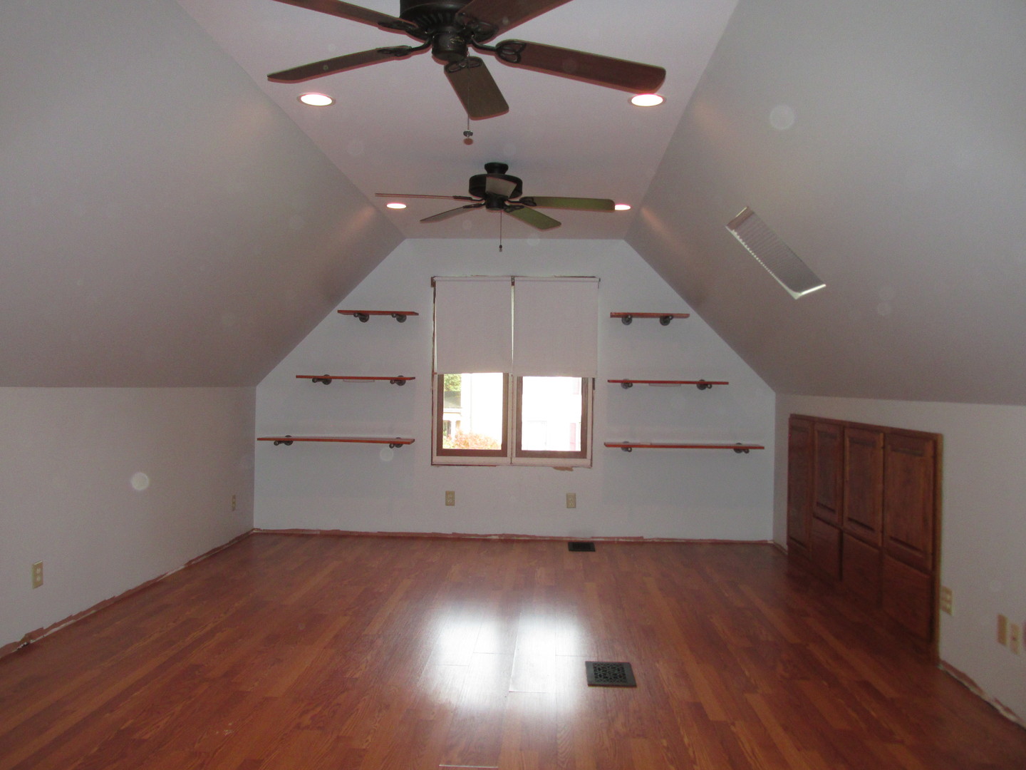 603 North 8th Street Rochelle, IL 61068 - Photo 24 of 33 an empty room with wooden floor and windows